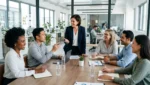 Leader facilitating a team discussion to improve employee motivation, engagement, and workplace performance.